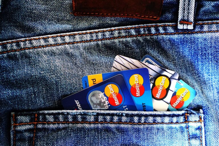 Credit cards, denim illustrating group booking payments
