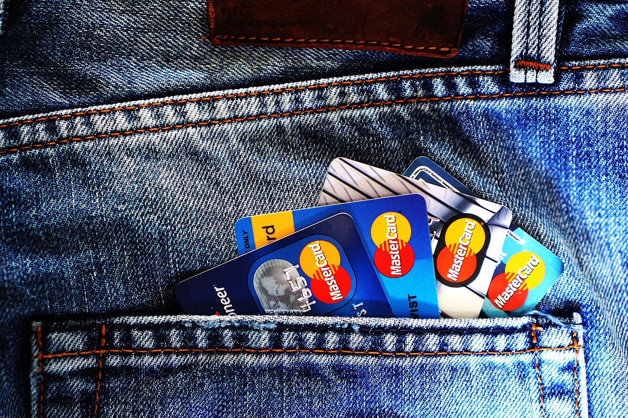 Credit cards, denim illustrating group booking payments