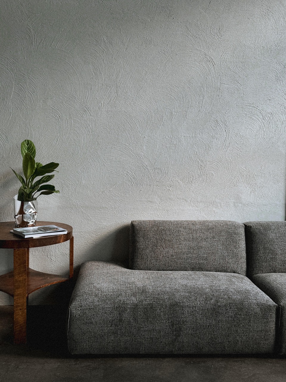 Sofa, side table illustrating room booking software